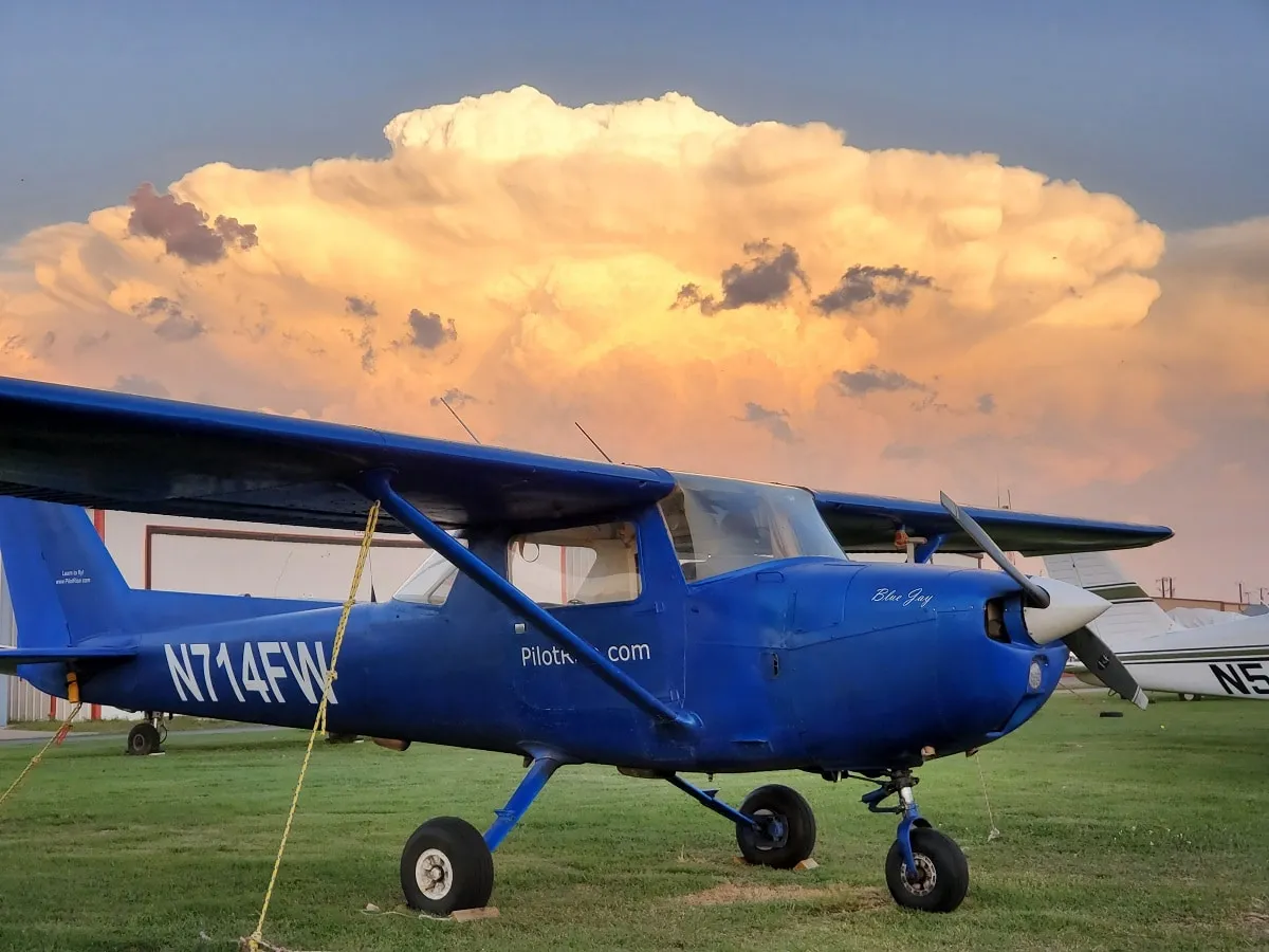 Pilot Rise Cessna 150 N714FW in sunlight