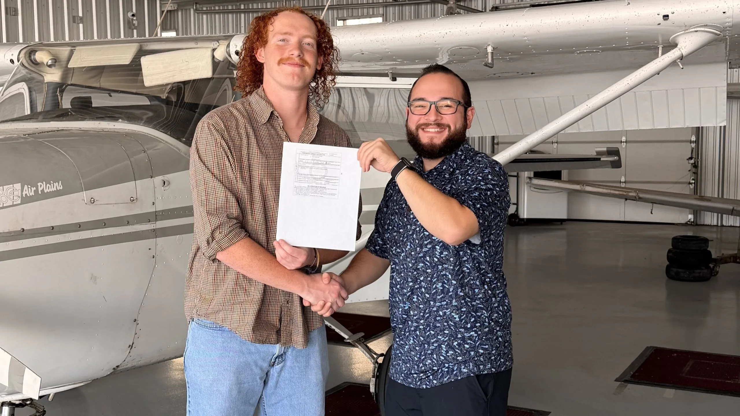 Pilot Rise instructor celebrating a student's pilot milestone
